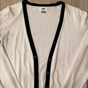 Cream colored cardigan with black accents